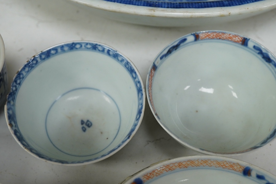 A collection of 18th century and later Chinese porcelain to include tea bowls and saucers and a large dish (a.f), largest 33cm in diameter